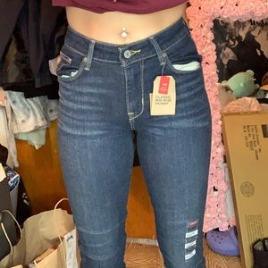 Levi Mid-Rise skinny jeans. LONG